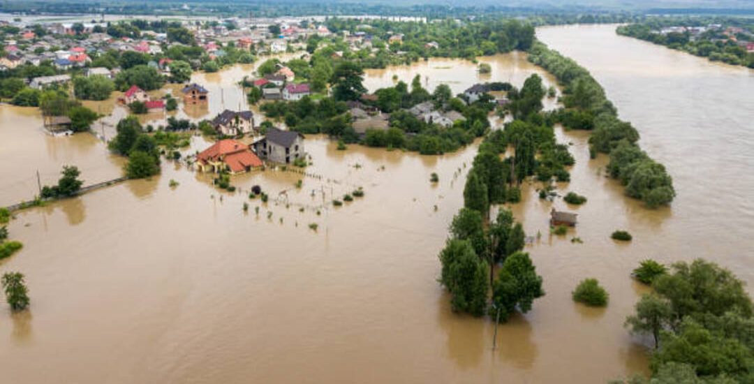 Aerial view of flooded houses with dirty water of Dnister river in Halych town, western Ukraine.