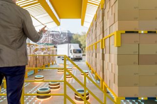 Automated robot carriers in modern distribution warehouse.