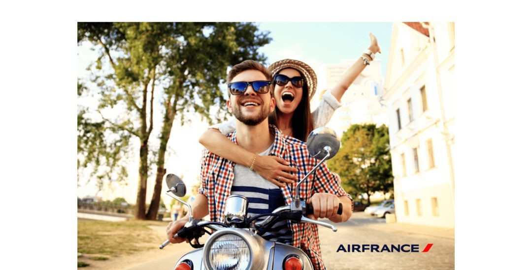 AF Couple riding a motorbike