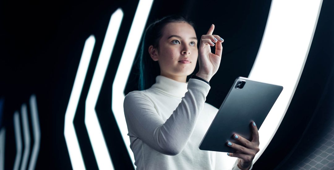 Asian girl pressing on digital screen futuristic technology