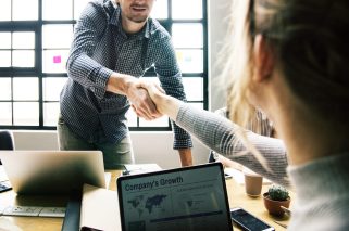 business-people-shaking-hands-agreement