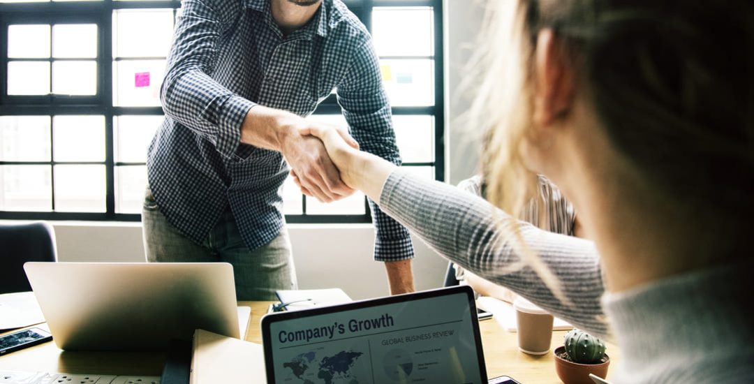 business-people-shaking-hands-agreement