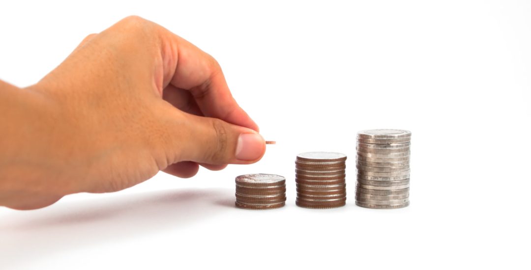 diagram consisting of piles of coins, denotes the artificial creation of the financial crisis