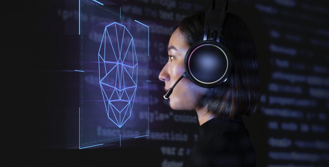 female-programmer-scanning-her-face-with-biometric-security-technology-on-virtual-screen-digital-remix (1)