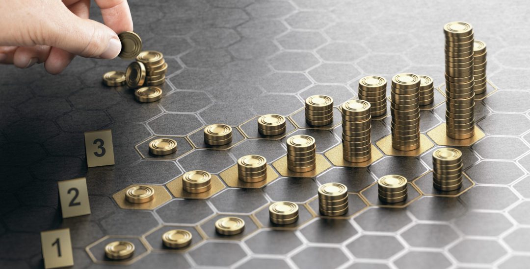 Human hand stacking generic coins over a black background with hexagonal golden shapes. Concept of investment management and portfolio diversification. Composite image between a hand photography and a 3D background.