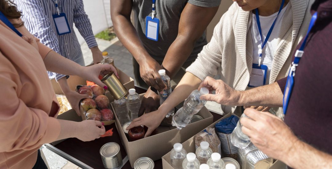 group-different-people-volunteering-foodbank-poor-people