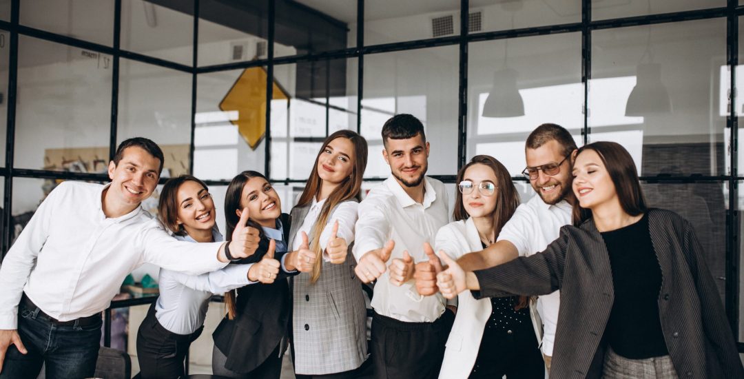Group of people working out business plan in an office