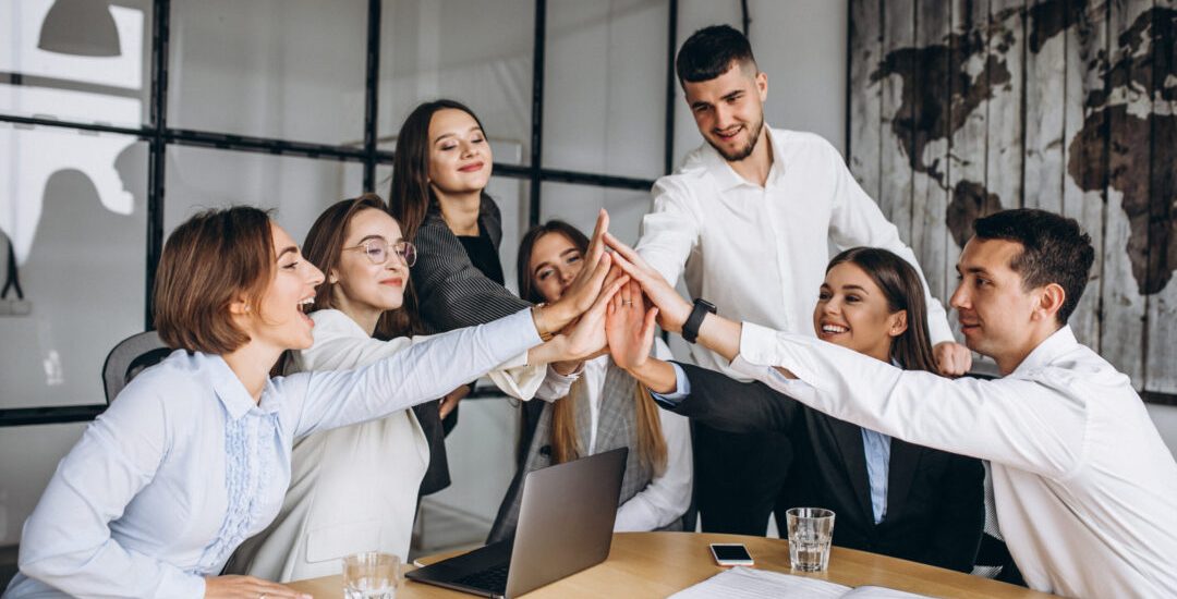 Group of people working out business plan in an office
