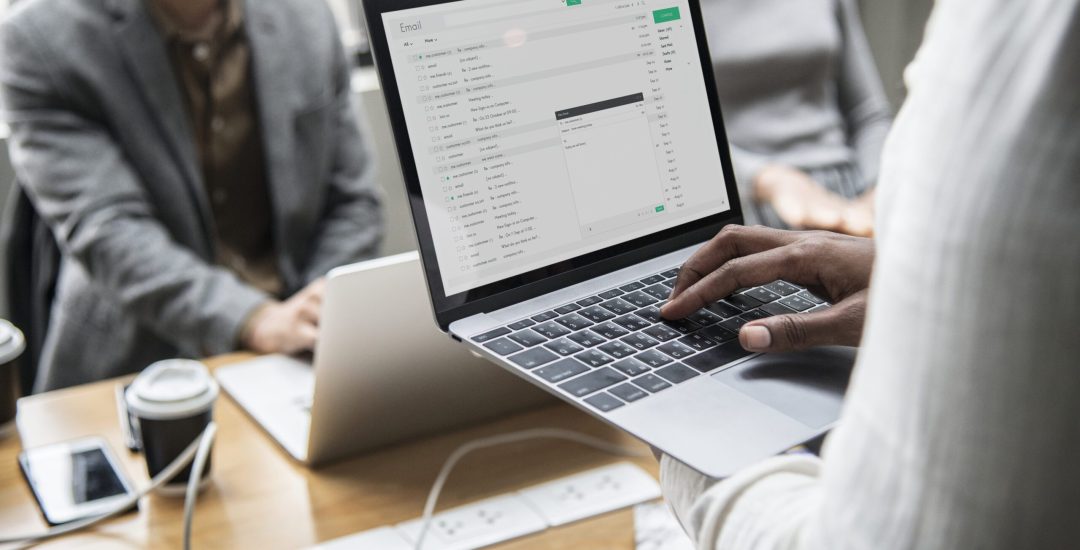 man-checking-his-email-on-laptop