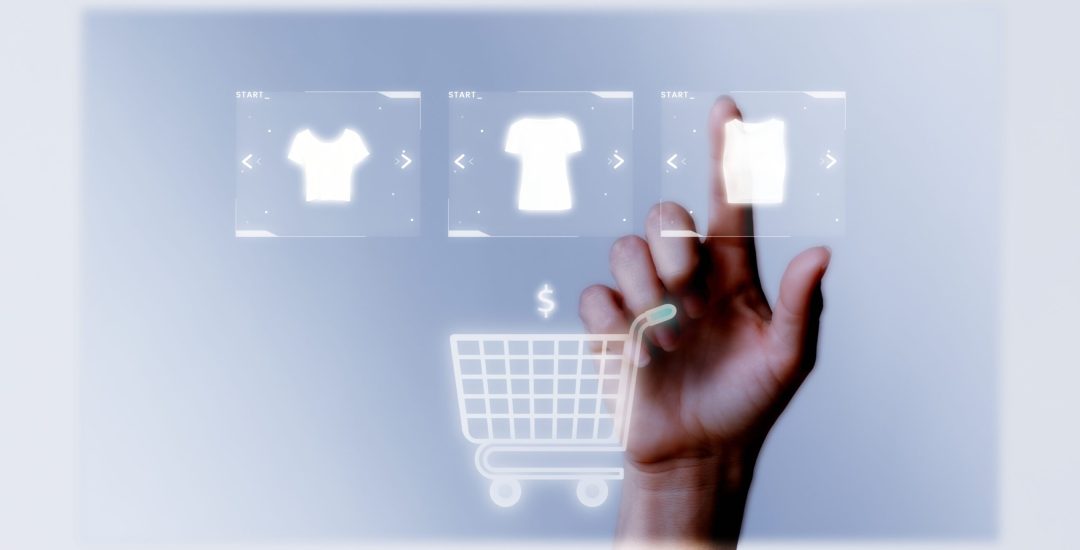Person adding clothes to cart closeup for online shopping campaign