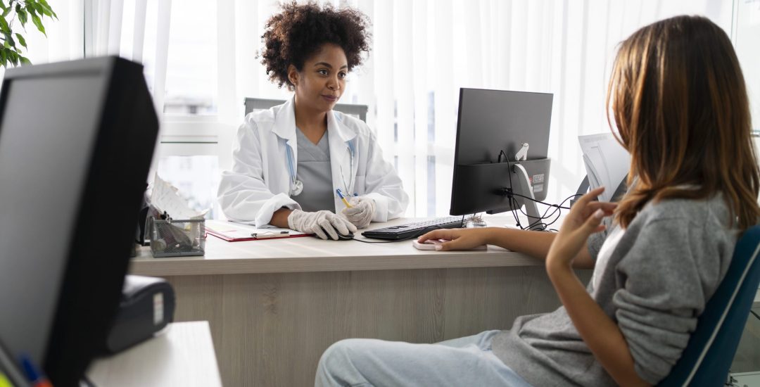 side-view-patient-talking-to-doctor
