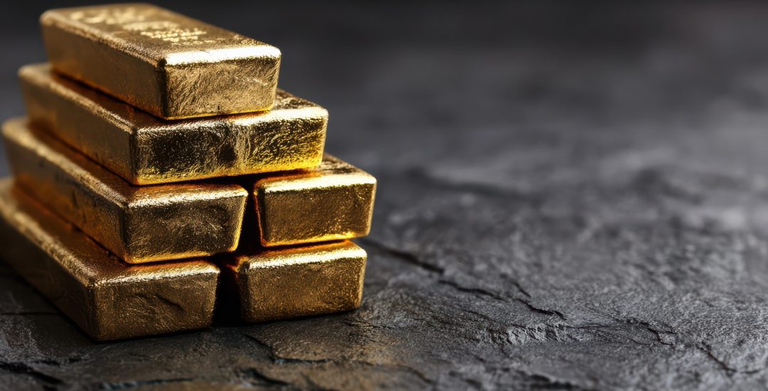 stack-gold-bars-dark-background