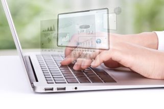 worker-looking-laptop-graphics