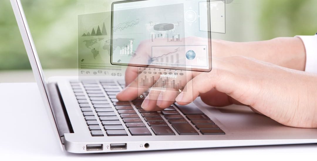worker-looking-laptop-graphics