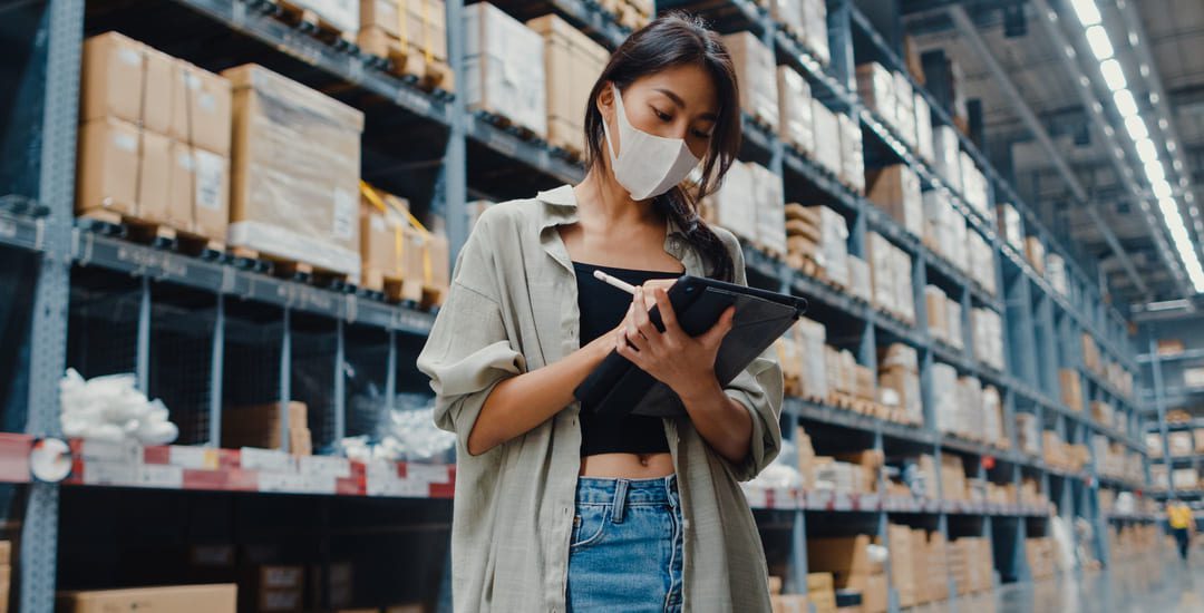 young-asian-businesswoman-manager-wearing-face-mask-warehouse-using-digital-tablet-checking-inventory (1)