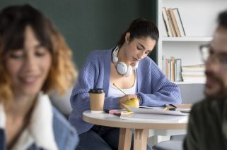 young-woman-taking-notes-study-session
