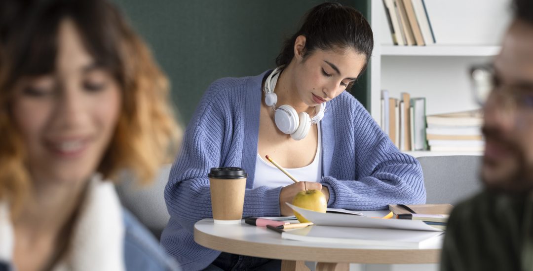 young-woman-taking-notes-study-session